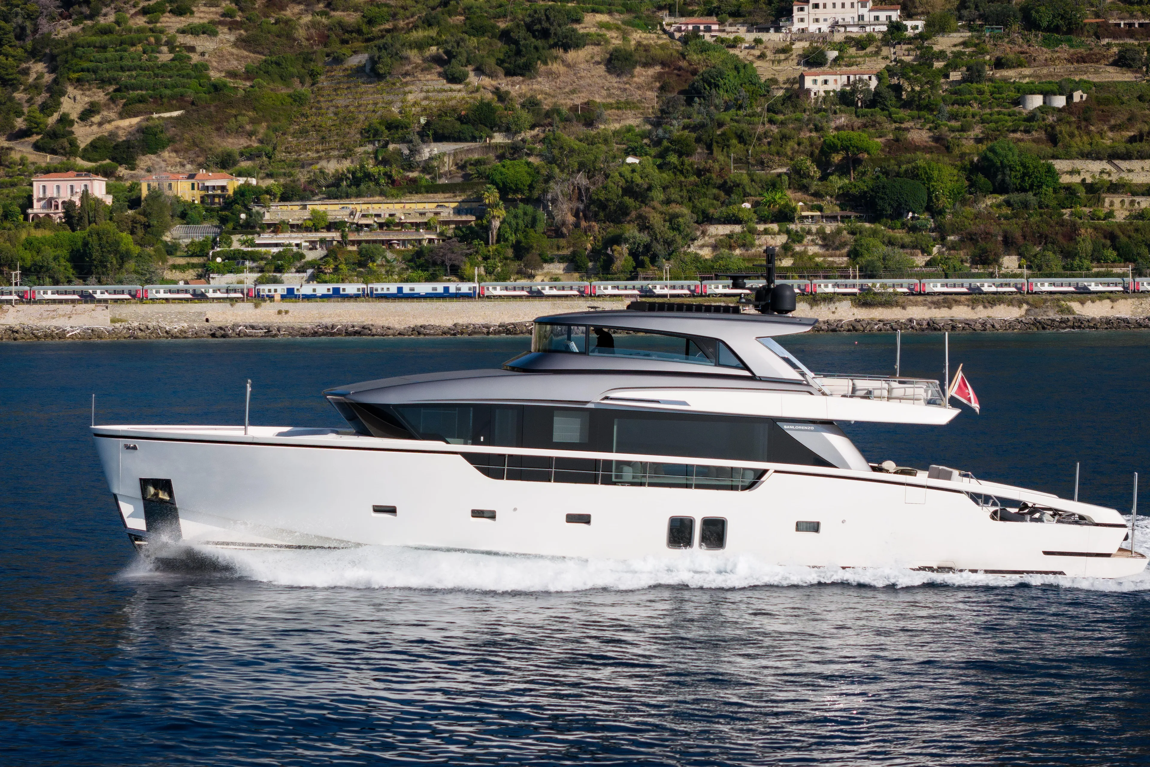 La Yacht Photos Pics Sanlorenzo SX88 2022 yacht cruising near scenic coastline.