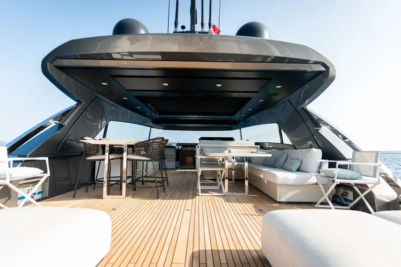 La Yacht Photos Pics Luxurious 2022 Sanlorenzo SX88 yacht deck with elegant seating and dining area.