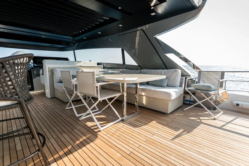 La Yacht Photos Pics Luxurious 2022 Sanlorenzo SX88 yacht deck with elegant seating and ocean view.
