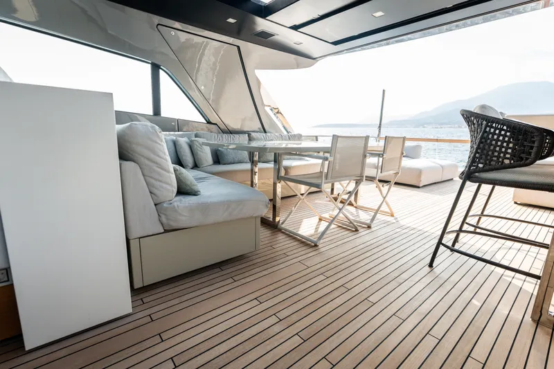 La Yacht Photos Pics Luxurious 2022 Sanlorenzo SX88 yacht deck with elegant seating and ocean view.