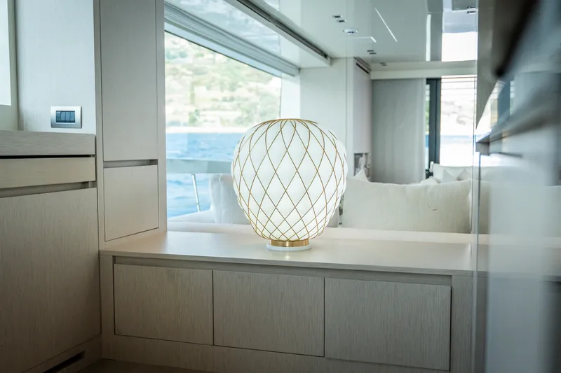 La Yacht Photos Pics Luxurious interior of 2022 Sanlorenzo SX88 yacht with elegant modern lamp.