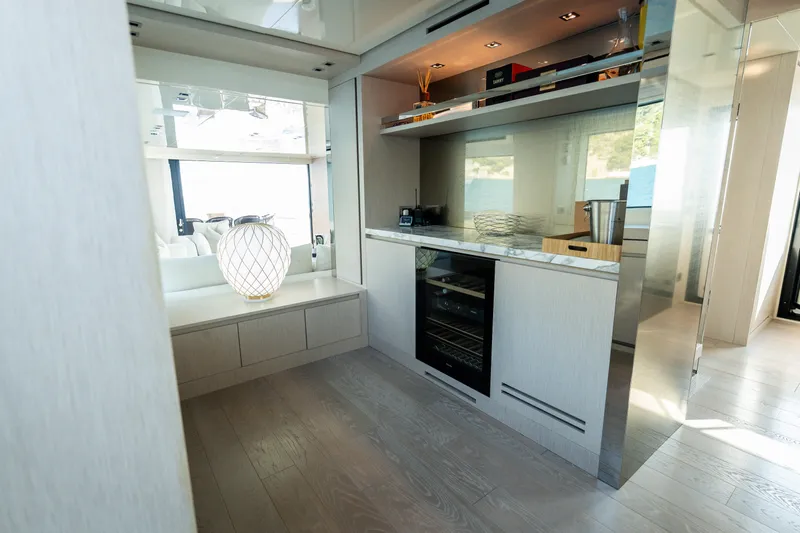 La Yacht Photos Pics Luxurious interior of 2022 Sanlorenzo SX88 yacht with modern decor and elegant lighting.