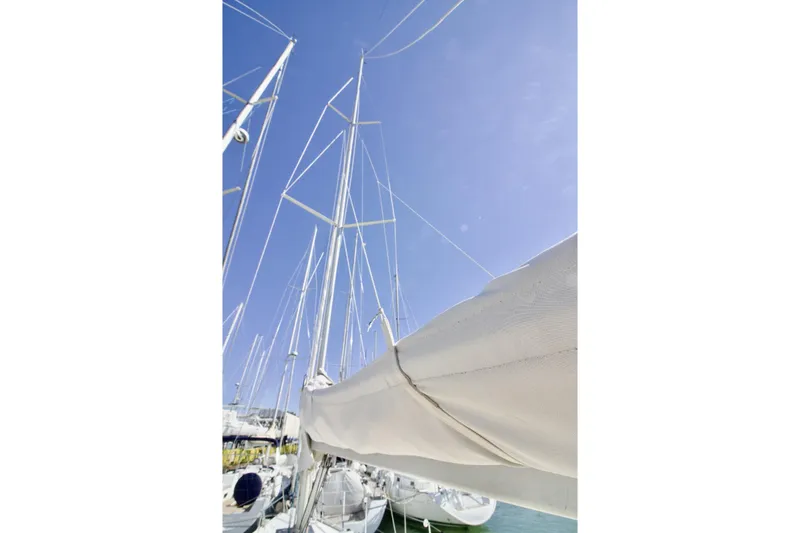  Yacht Photos Pics Sailboat mast and rigging of 2008 Hanse 370e against clear blue sky.