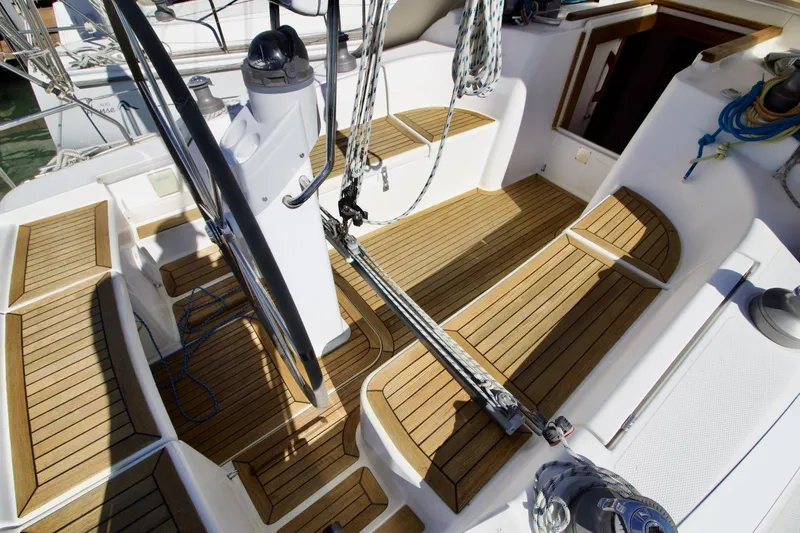  Yacht Photos Pics 2008 Hanse 370e yacht cockpit with teak flooring and steering wheel.