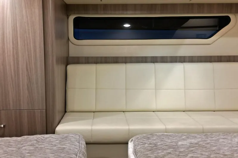  Yacht Photos Pics Interior of 2023 Regal 42 Fly yacht with beige seating and modern design.