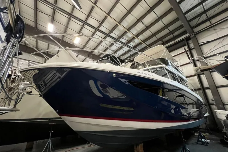  Yacht Photos Pics 2023 Regal 42 Fly yacht in indoor storage, showcasing sleek design and modern features.