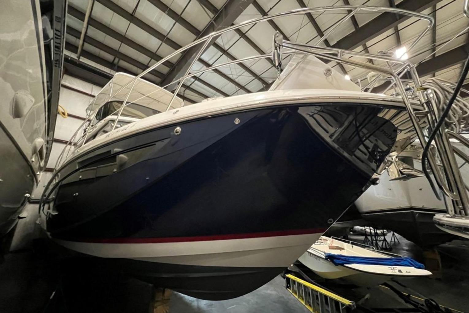 2023 Regal 42 Fly yacht in storage, showcasing sleek design and modern features.