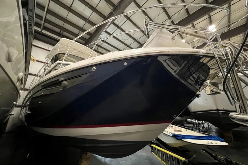  Yacht Photos Pics 2023 Regal 42 Fly yacht in storage, showcasing sleek design and modern features.