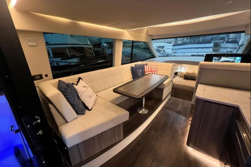  Yacht Photos Pics Luxurious interior of 2023 Regal 42 Fly yacht with elegant seating and modern design.