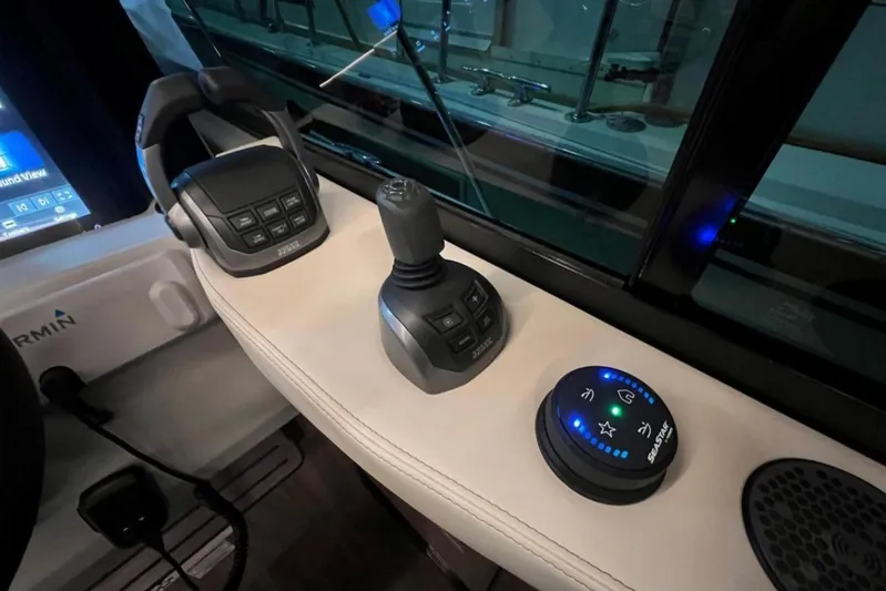 Yacht Photos Pics Control panel of 2023 Regal 42 Fly yacht with joystick and digital display.