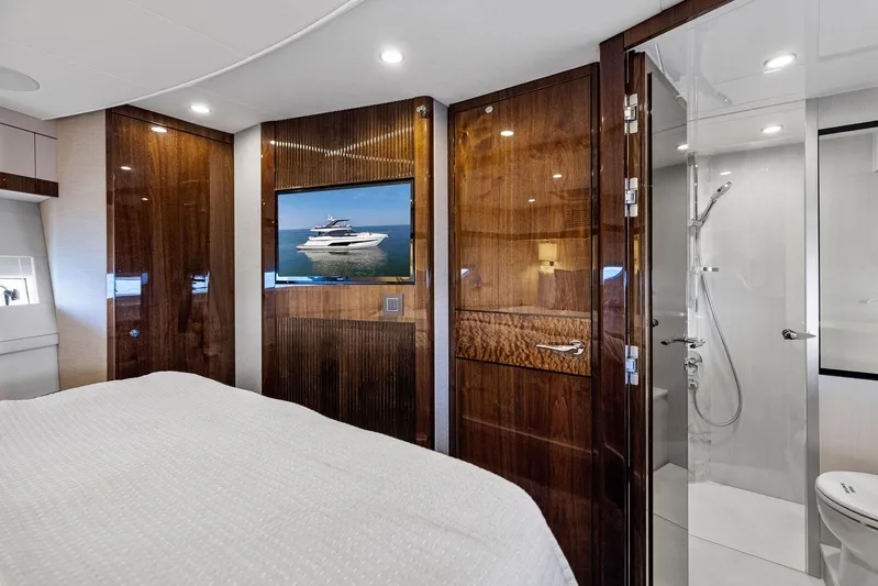  Yacht Photos Pics Luxurious cabin interior of 2024 Fairline Squadron 68 yacht with modern amenities.