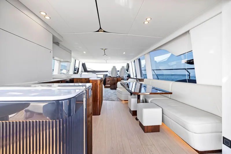  Yacht Photos Pics Luxurious interior of 2024 Fairline Squadron 68 yacht with modern seating and sleek design.