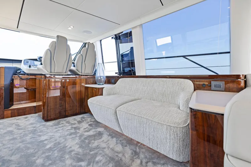  Yacht Photos Pics Luxurious interior of 2024 Fairline Squadron 68 yacht with plush seating and elegant design.