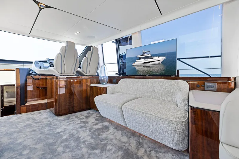  Yacht Photos Pics Luxurious interior of 2024 Fairline Squadron 68 yacht with plush seating and modern design.