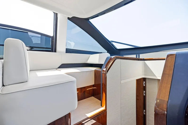  Yacht Photos Pics Interior of 2024 Fairline Squadron 68 yacht, featuring modern seating and sleek design.