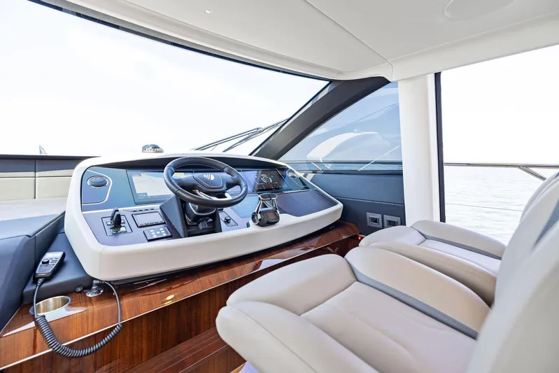  Yacht Photos Pics Luxurious interior of 2024 Fairline Squadron 68 yacht helm station.