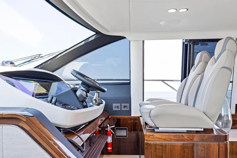  Yacht Photos Pics Interior of 2024 Fairline Squadron 68 yacht with modern helm and seating.