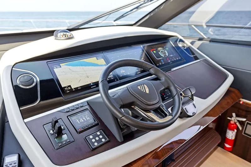  Yacht Photos Pics 2024 Fairline Squadron 68 yacht helm with advanced navigation displays and controls.