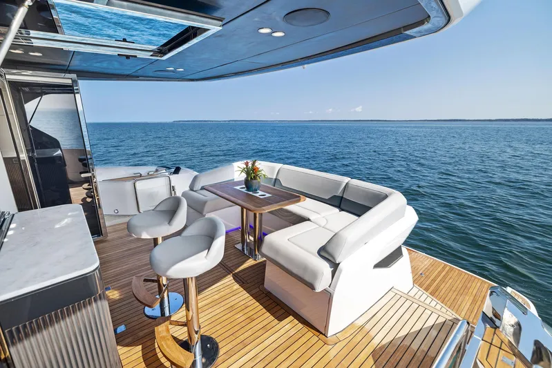  Yacht Photos Pics Luxury deck of 2024 Fairline Squadron 68 yacht with ocean view.