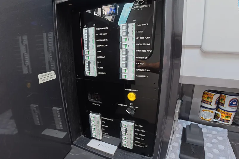  Yacht Photos Pics Electrical control panel on a 2025 Schaefer V44 yacht, featuring labeled switches and controls.