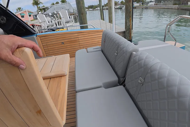  Yacht Photos Pics Luxury seating on Schaefer V44 yacht, 2025 model, docked by waterfront.