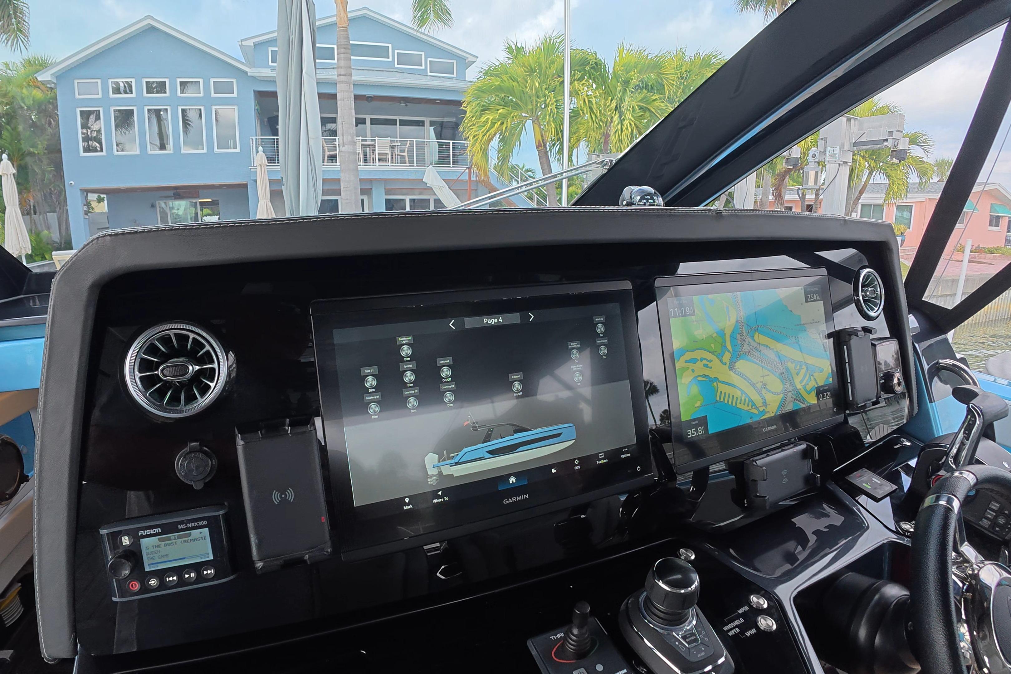 Interior dashboard of 2025 Schaefer V44 yacht with advanced navigation displays.