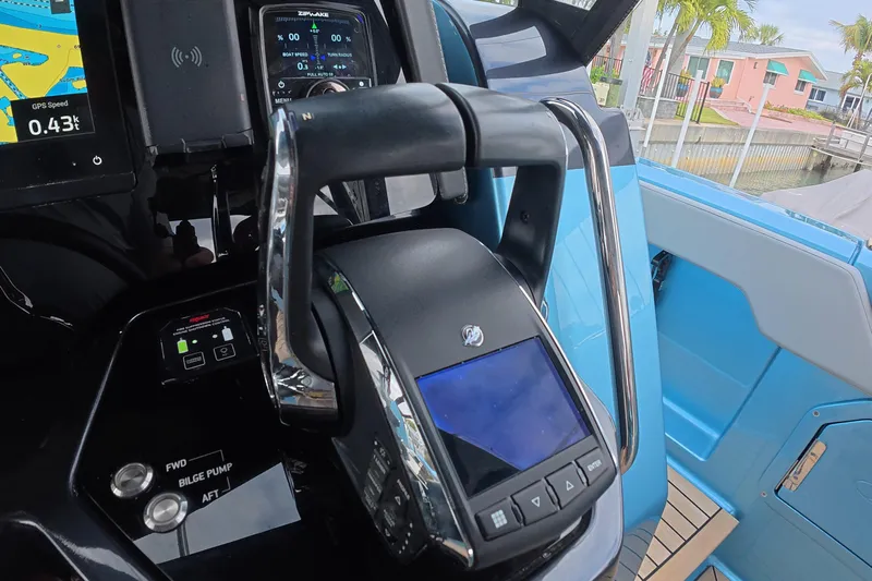  Yacht Photos Pics Control panel of 2025 Schaefer V44 yacht with navigation and throttle systems.