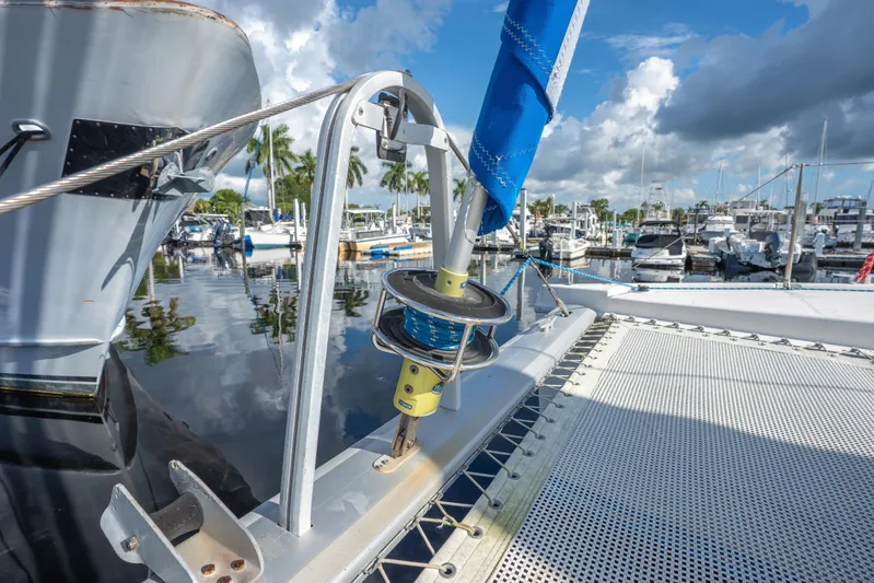 Lovely Cruise Yacht Photos Pics 2011 Leopard 38 catamaran docked at marina with clear blue sky.