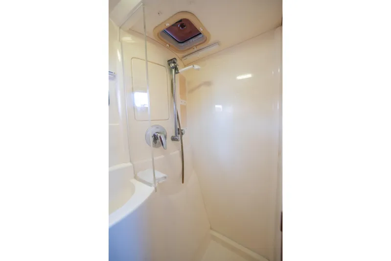 Lovely Cruise Yacht Photos Pics Shower area in 2011 Leopard 38 yacht, featuring sleek design and modern fixtures.