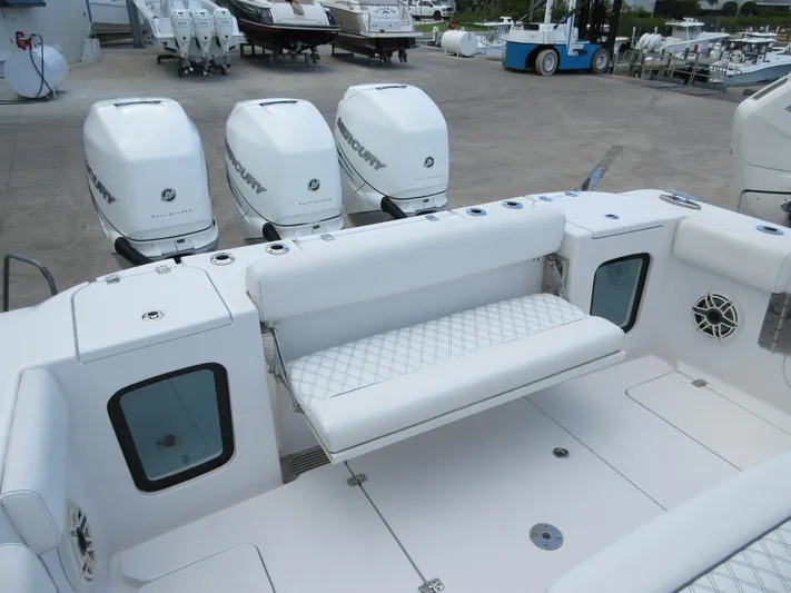 "here We Go" Yacht Photos Pics 2021 Sportsman Open 352 Center Console with quad Mercury engines and white seating.