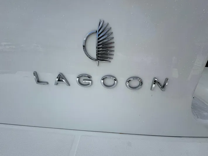 Eden Yacht Photos Pics Lagoon 46 logo on a 2022 model yacht, featuring sleek metallic lettering.