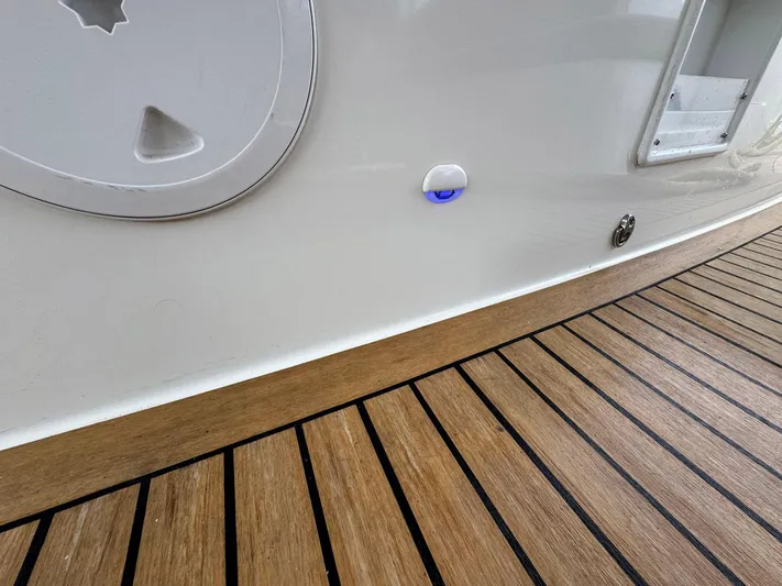 Eden Yacht Photos Pics Teak deck and hull detail of 2022 Lagoon 46 catamaran.