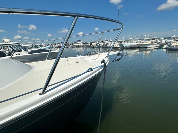 Reveille Yacht Photos Pics 2013 Back Cove 34 boat docked in a marina under a clear blue sky.