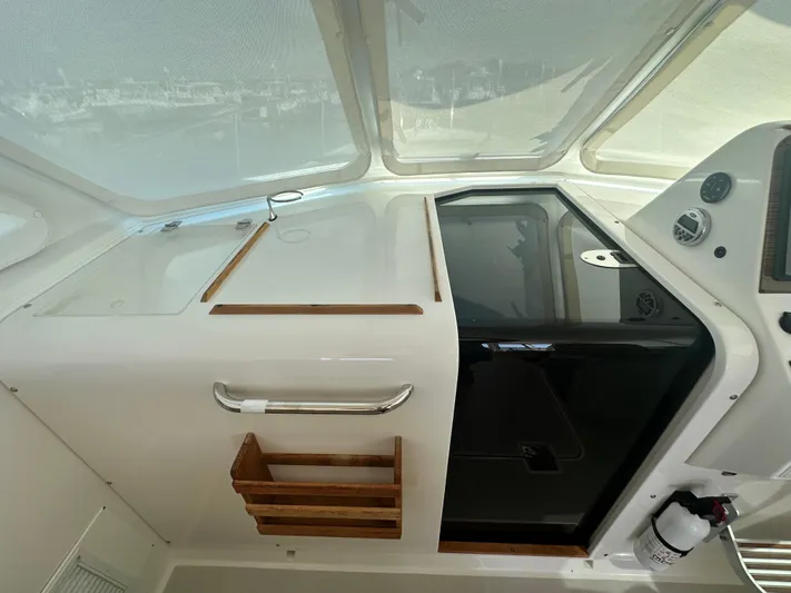 Reveille Yacht Photos Pics 2013 Back Cove 34 boat interior with sleek design and modern controls.