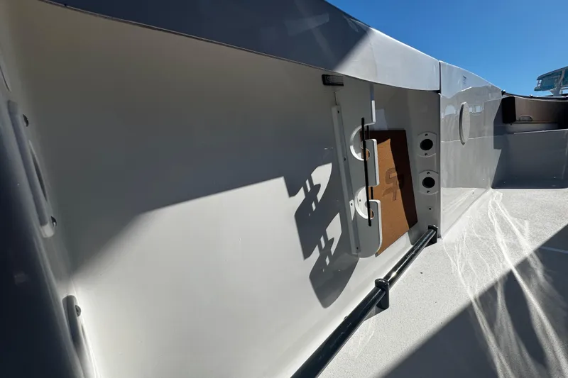  Yacht Photos Pics 2026 Sea Pro 245FLX Sandbar boat interior with sleek design and storage features.