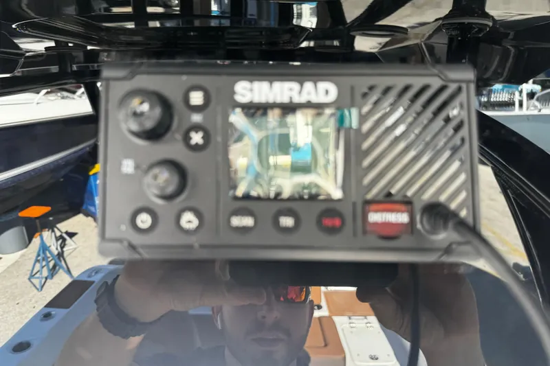  Yacht Photos Pics Simrad marine device on 2026 Sea Pro 245FLX Sandbar boat, close-up view.