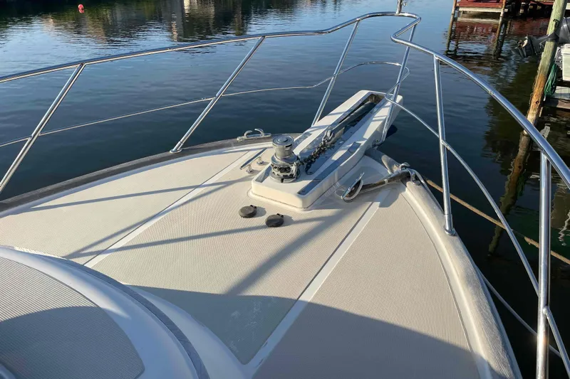 Free Ride Yacht Photos Pics Bow of a 2002 President Trawler yacht with stainless steel railings.