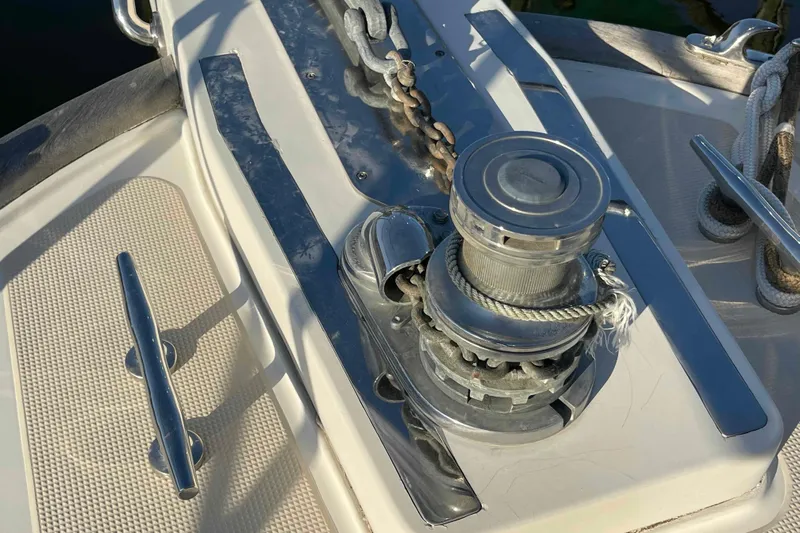 Free Ride Yacht Photos Pics Anchor winch on 2002 President Trawler boat deck with ropes and cleats.