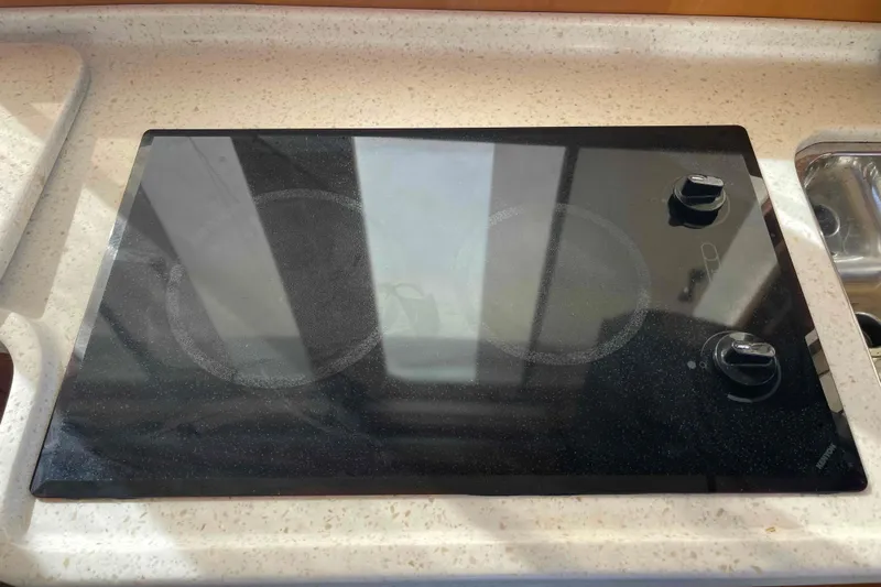 Free Ride Yacht Photos Pics Glass stovetop on a 2002 President Trawler yacht kitchen counter.