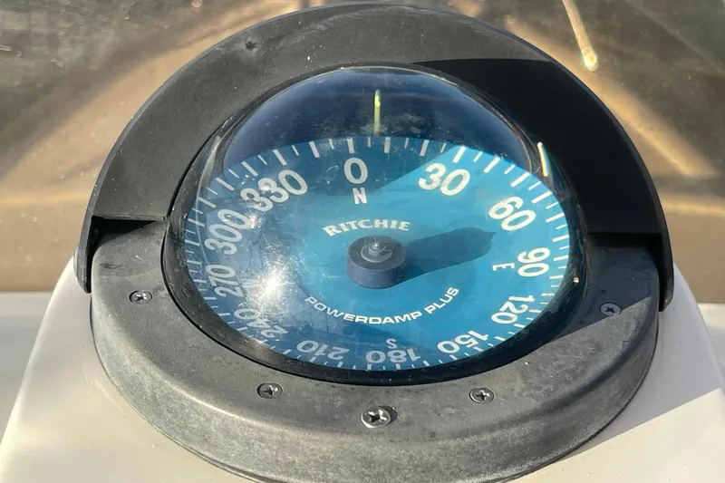 Free Ride Yacht Photos Pics Compass on 2002 President Trawler, Ritchie Powerdamp Plus, showing navigation directions.