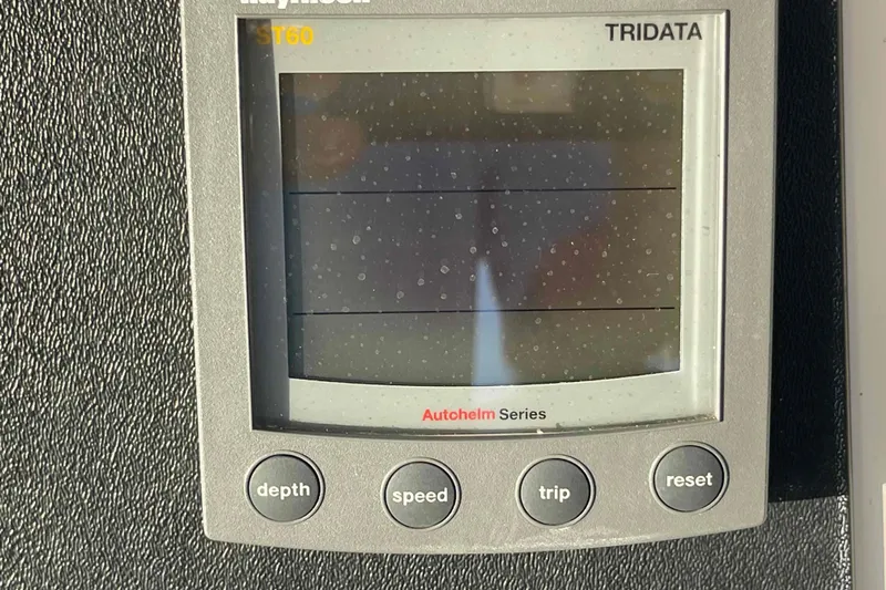 Free Ride Yacht Photos Pics Raymarine ST60 Tridata display on 2002 President Trawler, showing depth, speed, and trip functions.