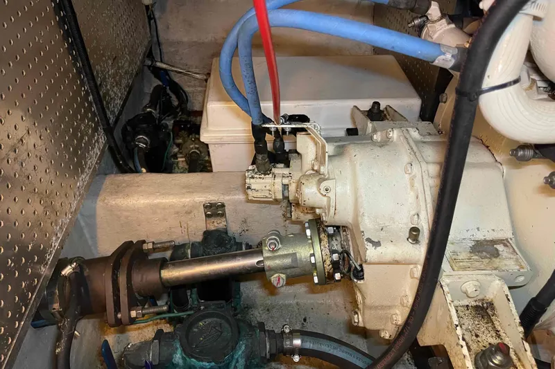 Free Ride Yacht Photos Pics Engine room of a 2002 President Trawler with visible mechanical components.