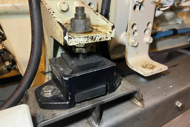 Free Ride Yacht Photos Pics Engine mount detail on a 2002 President Trawler, showcasing mechanical components and connections.