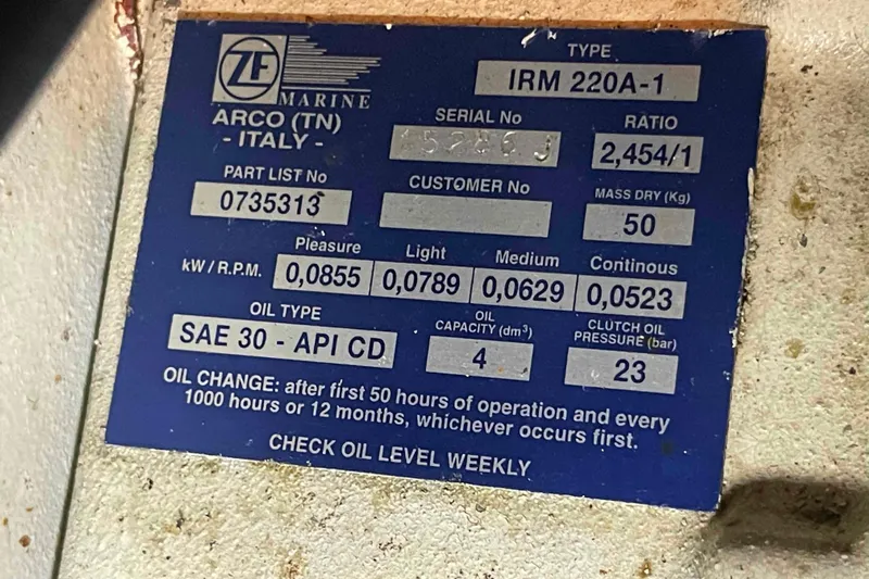 Free Ride Yacht Photos Pics ZF Marine IRM 220A-1 label on 2002 President Trawler, detailing oil type and specifications.