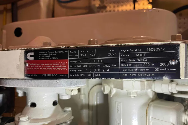 Free Ride Yacht Photos Pics Cummins engine label on a 2002 President Trawler, model 6BT5.9-M, with specifications.