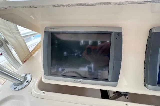  Yacht Photos Pics Garmin GPS display on 2011 Grady-White Canyon 306 boat dashboard.