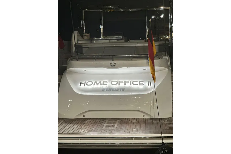 Home Office II Yacht Photos Pics 2023 Princess V60 yacht named "Home Office II" with illuminated nameplate and flag.