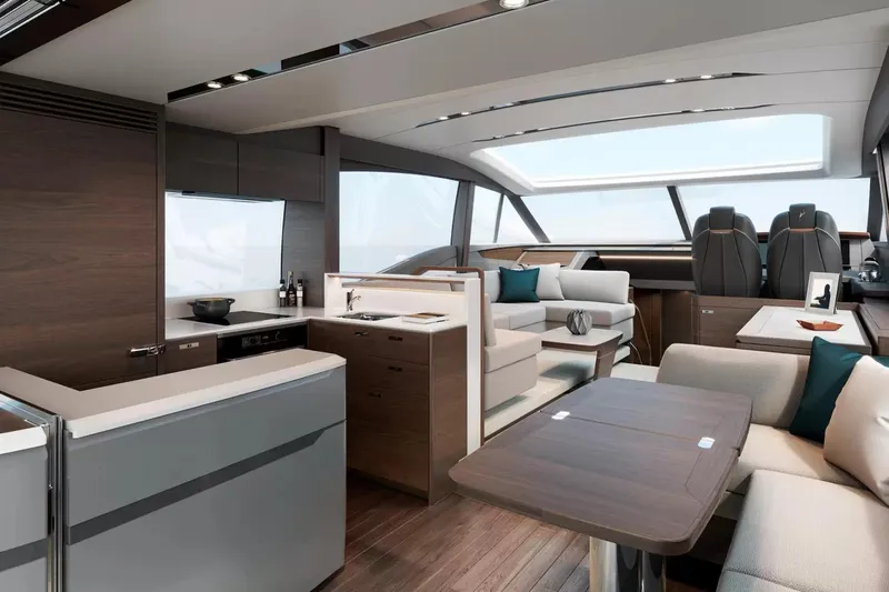 Home Office II Yacht Photos Pics Luxurious interior of 2023 Princess V60 yacht with modern kitchen and seating area.