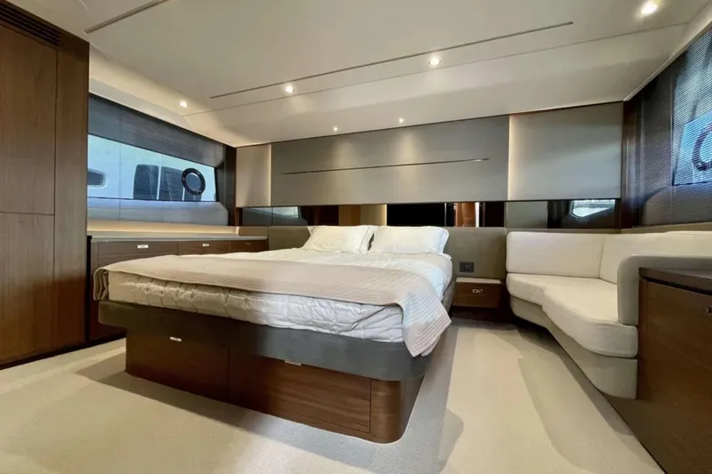 Home Office II Yacht Photos Pics Luxurious 2023 Princess V60 yacht bedroom with modern design and elegant furnishings.