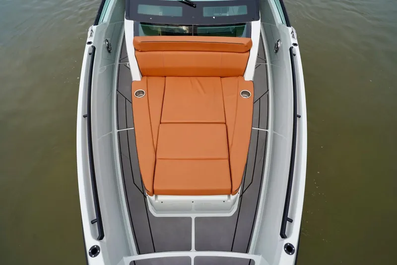  Yacht Photos Pics 2023 Saxdor 320 GTO boat with orange seating and sleek design on water.